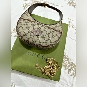 Gucci half moon bag in mint condition!